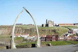 Seaside town in North Yorkshire near Robin Hood's Bay, where Captain Cook's ship Endeavour was built and the favourite Victorian gem jet is mined (6) - wordplays.com