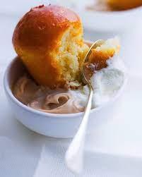 rum soaked cake crossword clue