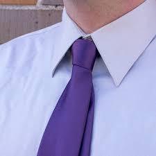 Explain Neckwear consisting of a long narrow piece of material worn